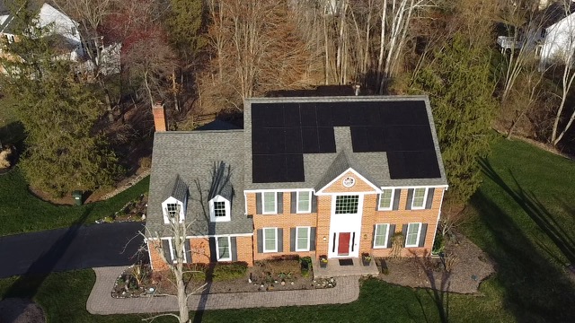 A beautifully decorated house illuminated with Christmas lights, spreading holiday cheer.